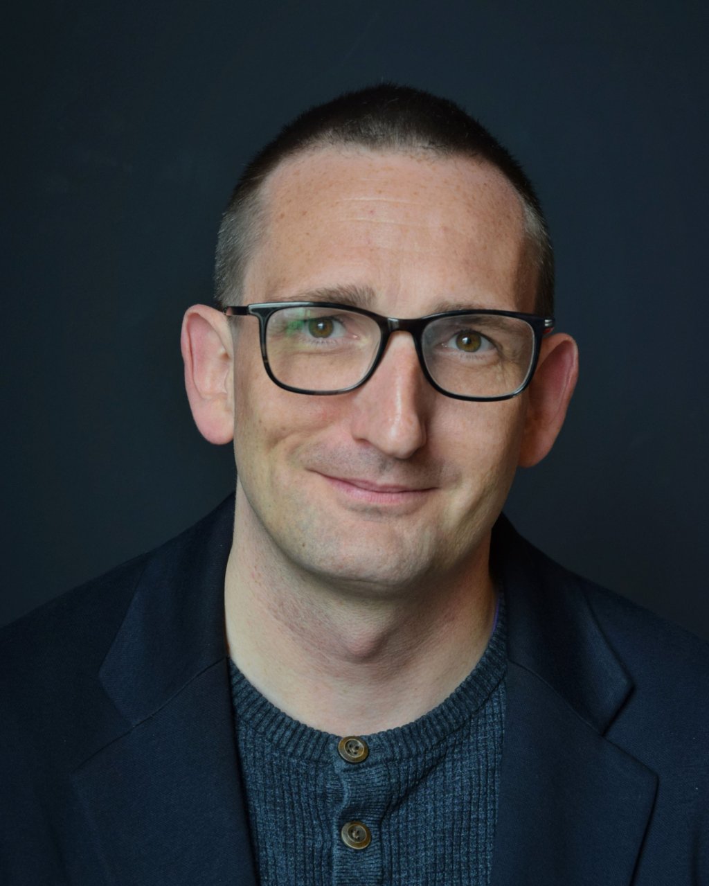 A portrait of Dan Barrett.